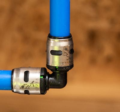 A SharkBite EvoPEX Push-to-Connect Fitting installed