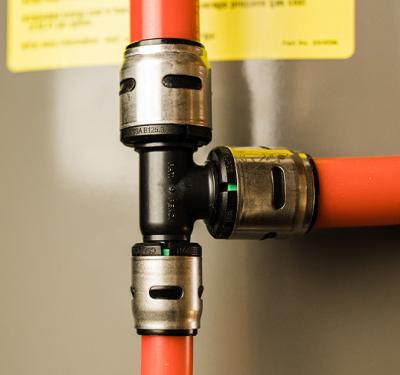 EvoPEX push-to-connect system being installed during home construction