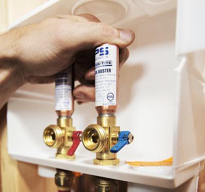 SharkBite brass push-to-connect outlet box for washing machine and ice maker installations, featuring secure mounting system with no additional framing required for simple behind-wall plumbing connections