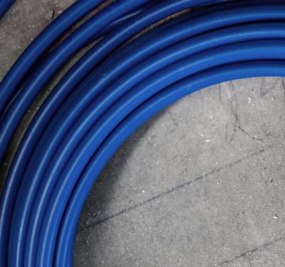 Coiled SharkBite PEX-A potable water tubing with superior flexibility and durability for residential and commercial plumbing applications
