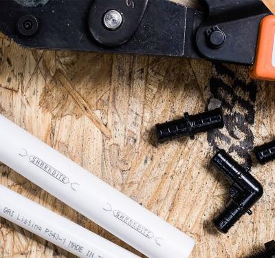 Corrosion resistant poly crimp fittings and valves for PEX systems