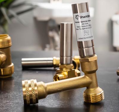 SharkBite water hammer arrestors with pressure-absorbing chambers to protect plumbing systems from water hammer damage and noise
