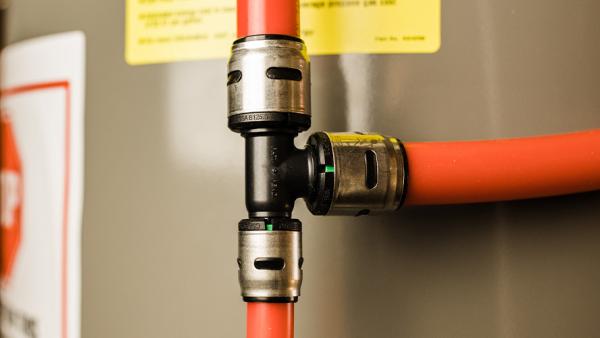 EvoPEX push-to-connect system being installed during home construction