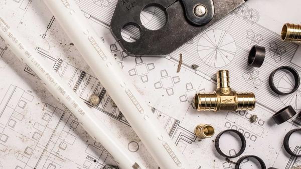Brass crimp tees for PEX plumbing systems offering durable and secure pipe connections