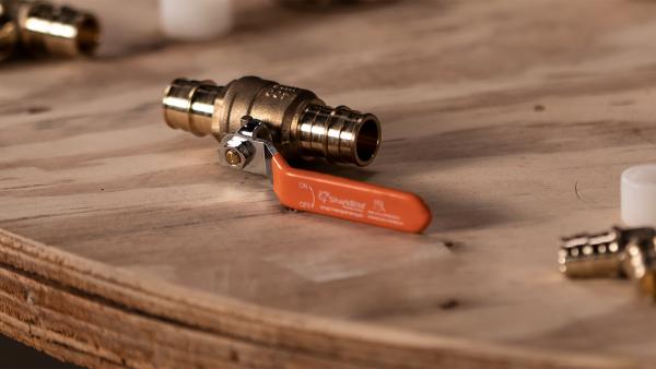 SharkBite brass expansion fittings for PEX-A pipe connections