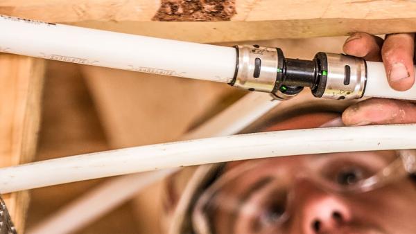 EvoPEX push-to-connect system being installed during home construction