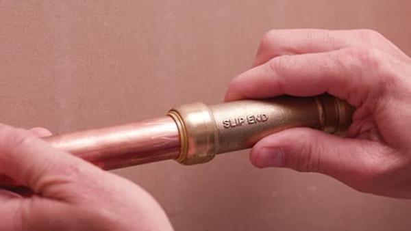 How to repair a leaking pipe using a SharkBite slip coupling, demonstrating quick and reliable plumbing repair for homeowners and professionals.