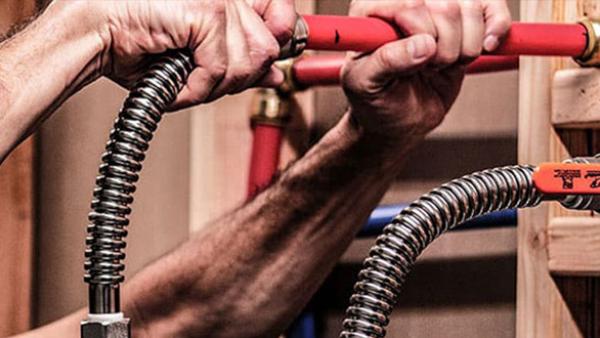 SharkBite water heater connectors and valves for flexible and secure plumbing installations