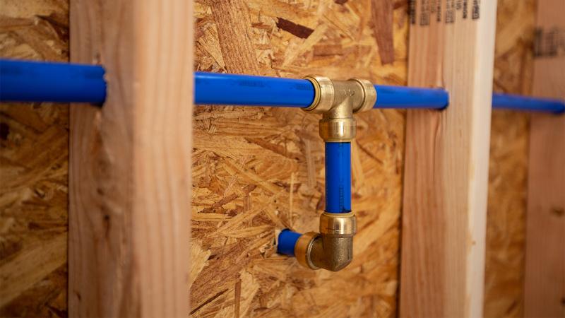 brass push behind the wall