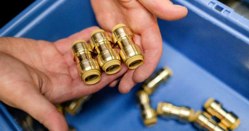 Inside look at SharkBite’s manufacturing facility, highlighting advanced plumbing technology and quality control in push-to-connect fittings production.