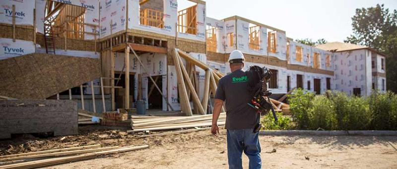 Plumber working on-site during labor shortage, representing workforce challenges and skilled trade demands in the plumbing industry.